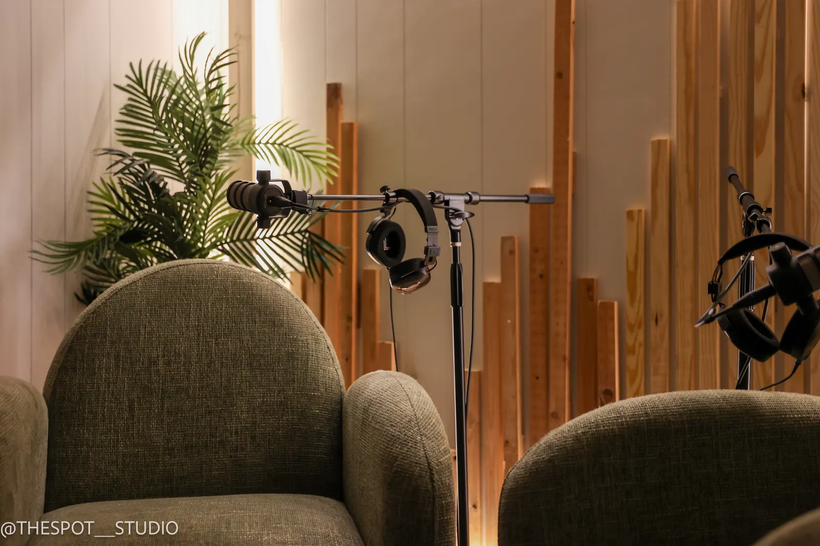 Boom microphone and headphones over the Neutral Room chairs