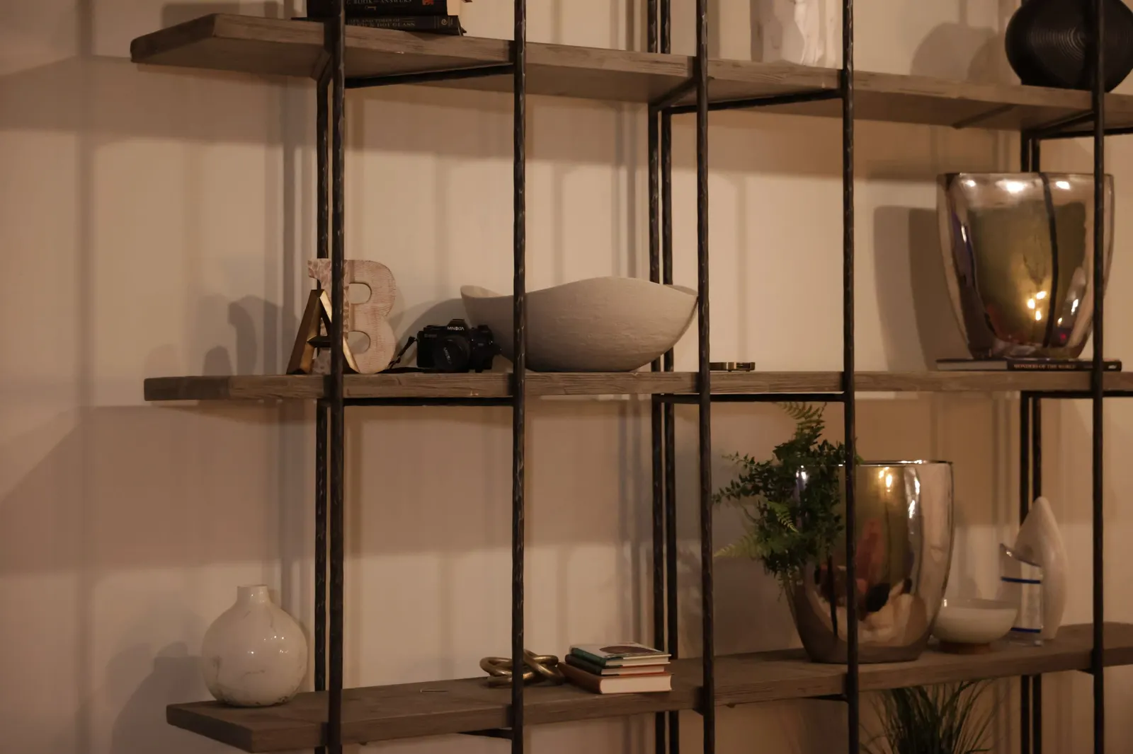 Styled shelving with camera and books
